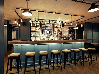 Pub interior design: wood floors in Walnut colour