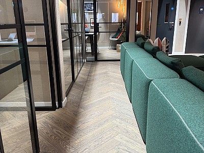 Herringbone oak parquet and oak stairs at Hatton Garden jewellers in London, Graphite colour