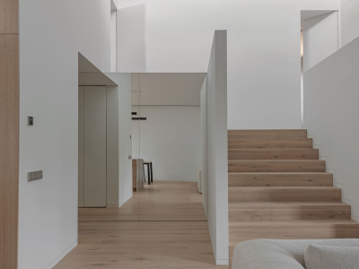 Minimalist style with wide oak floorboards and matching oak stairs in Ivory colour