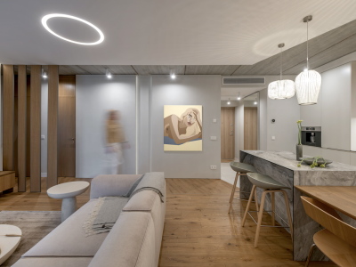 Grey wood flooring and lighting design harmony