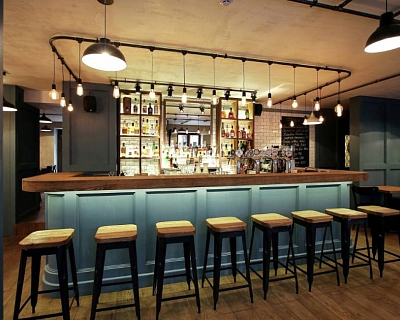 Pub interior design: wood floors in Walnut colour