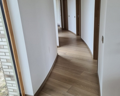 Wide plank wood flooring in Dunes colour
