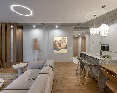 Grey wood flooring and lighting design harmony