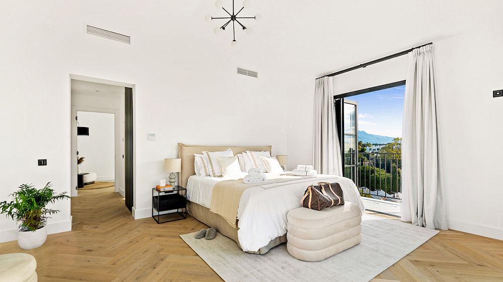 Embracing nature's charm: herringbone oak wood flooring at Villa Aura