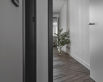 Dark wood floors: herringbone parquet in Ebony colour
